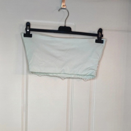 Women's clothing set used, turquoise with lace details
