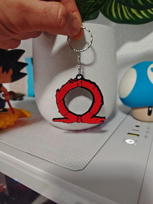 God of War keychain like new, black and red
