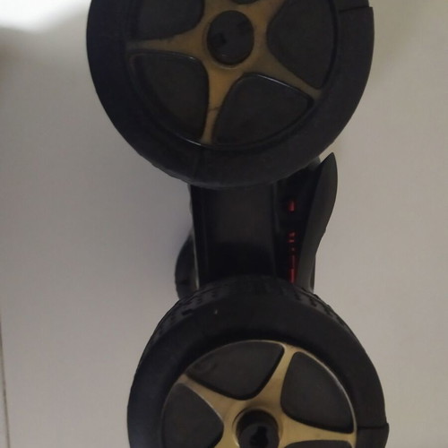 Remote control used with wheels that open to overcome obstacles