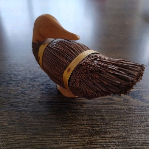 Handmade wooden duck woven from reeds, like new