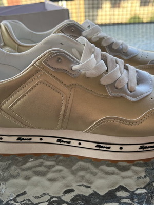 Athletic shoes new, size 40, white and gold