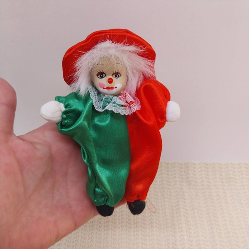 Miniature clown doll from Germany with ceramic face like new