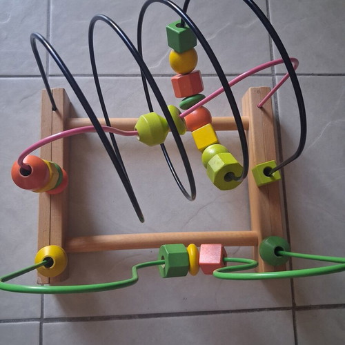 Wooden educational bead maze toy used, Montessori style for infants