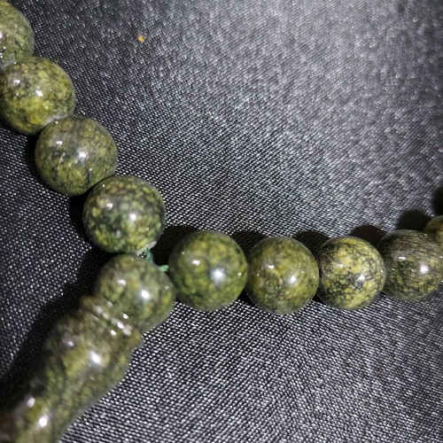 Decorative worry beads from semi-precious spiral stone