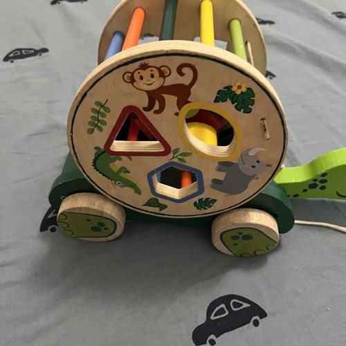 Wooden developmental toy with shapes, animals and colors like new