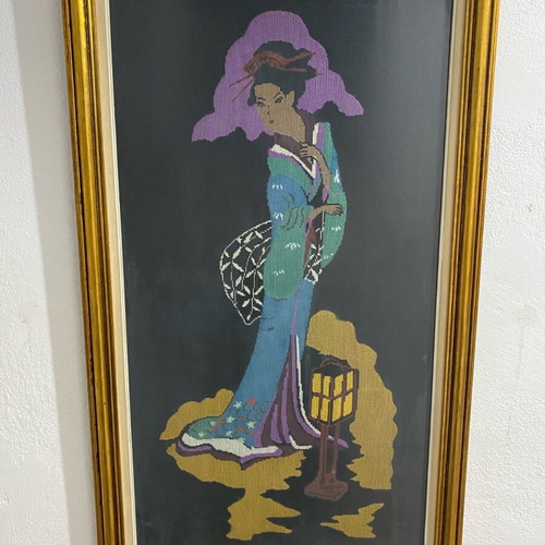 Textile painting with embroidered design used