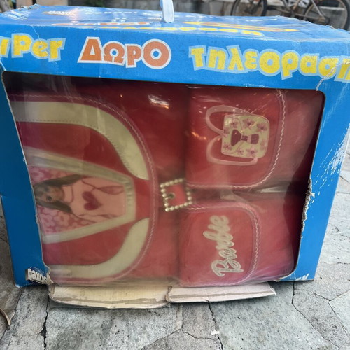 Vintage Paxos TV with bag and school supplies