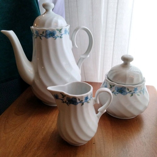 Vintage tea and coffee set in white porcelain like new