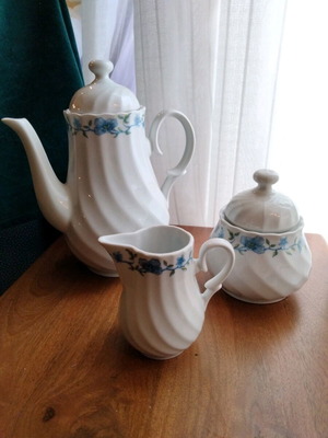 Vintage tea and coffee set in white porcelain like new
