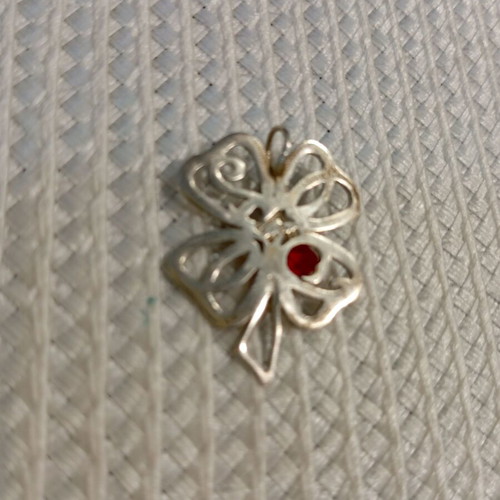 Silver 925 pendant with four-leaf clover and ruby stone