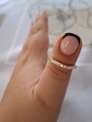 Hexagonal women's ring like new, gold color, size 19 or 20