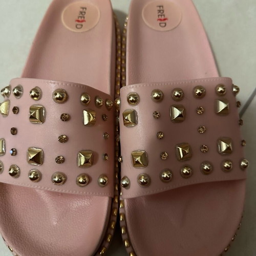 Keep Fred pink soft slippers like new with gold studs