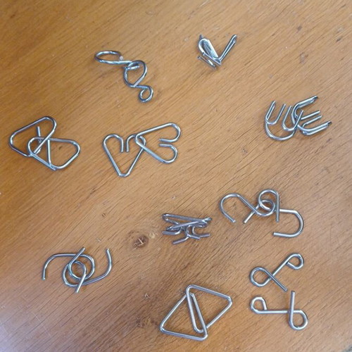 Metal wire puzzle set 10 pieces like new