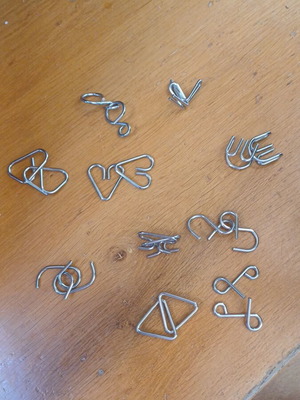 Metal wire puzzle set 10 pieces like new