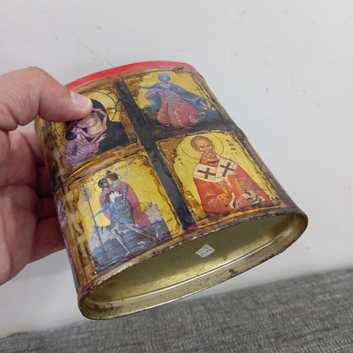 Vintage metal pencil holder decorated with icons used