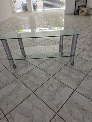 Glass TV table with wheels