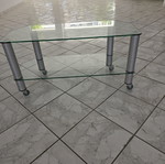 Glass TV table with wheels