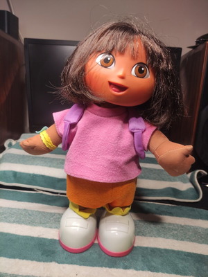 Dora the Explorer doll used, defective, talks and moves