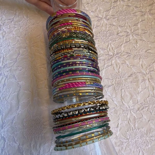Indian glass bracelets like new, set of 54, colorful and decorated