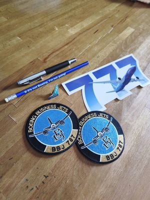 Boeing memorabilia set with pen, pencil, stickers, and patches