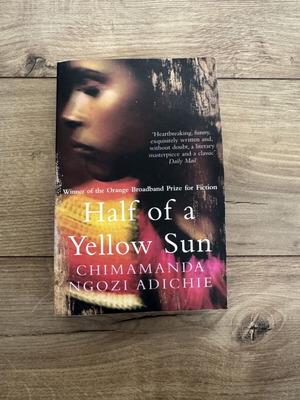 Half of a Yellow Sun by Chimamanda Ngozi Adichie used fiction book