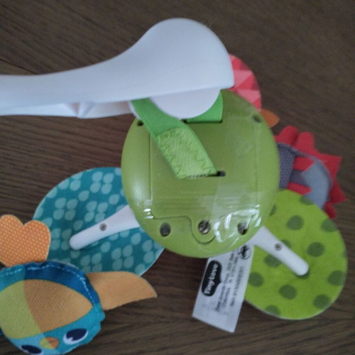 Tiny Love rotating toy used with music and colorful animals