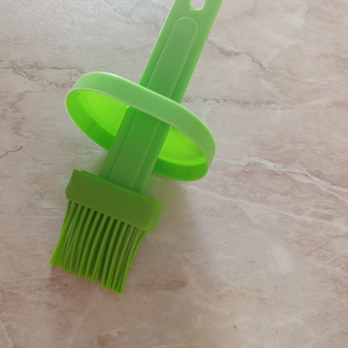 Kitchen brush with bowl and black napkin holder