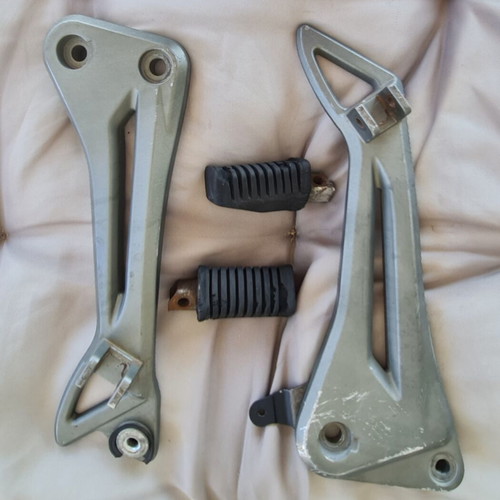 Modenas Kriss genuine footrest bracket with footpegs