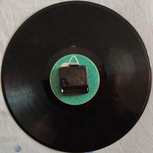 Imagine wall clock made from hand-painted vinyl record used
