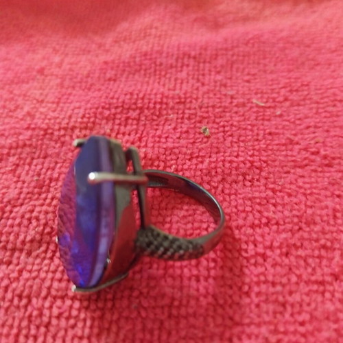 Ring with purple zircon, like new, silver color