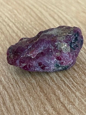 Raw large ruby 109ct in airtight display case