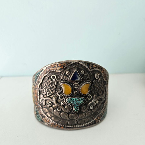 Handmade carved bracelet used with turquoise and silver