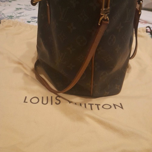 Louis Vuitton bag used with extra strap and storage pouch