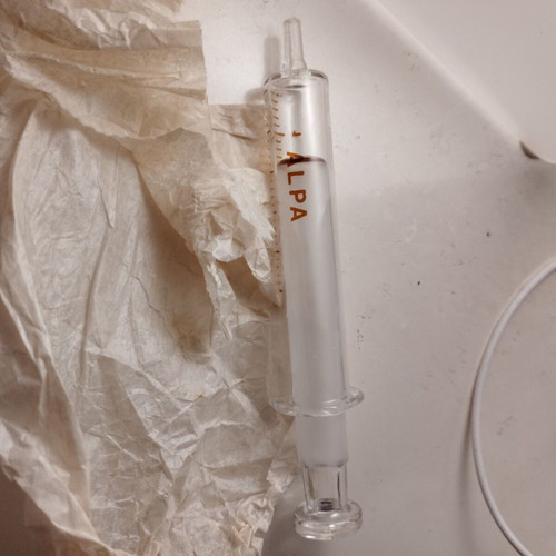 Vintage glass syringe in excellent condition in its box
