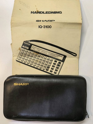 Sharp IQ-3100 electronic translator used with 2 modules and case