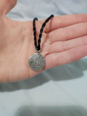 Necklace with Phaistos Disc used, black braided cord