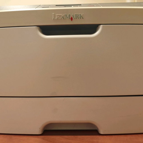 Lexmark E360dn laser printer with paper feed issue, suitable for parts