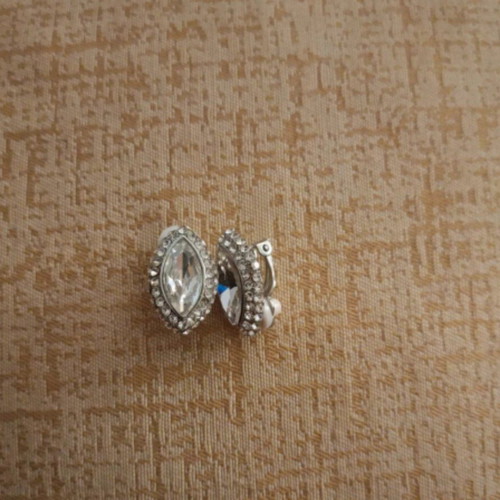 Clip earrings like new, silver rhinestones and central stone
