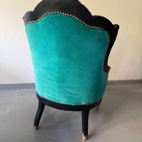 Vintage armchair with velvet upholstery