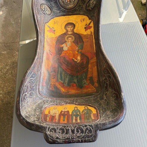 Handmade wooden trough with Orthodox icon used