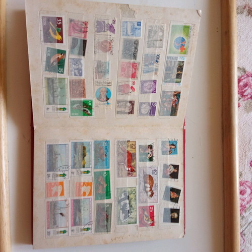 Stamp collection used with 16-page album
