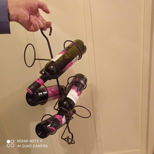 Hanging wine rack used, handmade iron