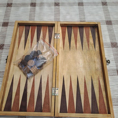 Wooden backgammon medium size used with pieces and dice