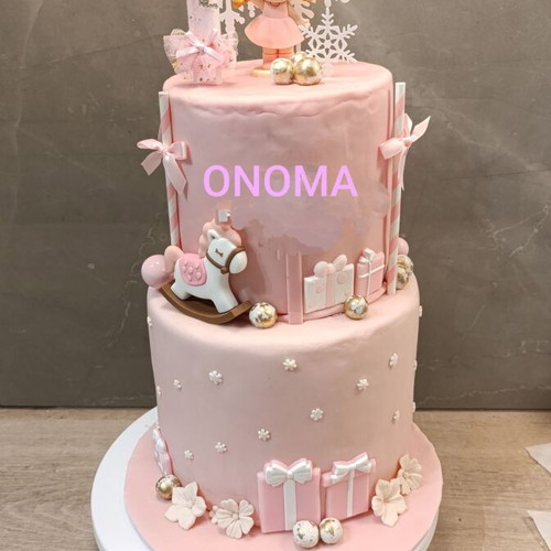 Decorative two-tier birthday cake new, made of fondant