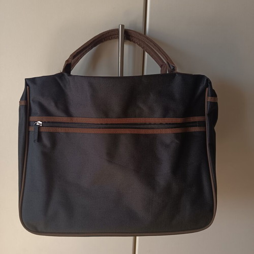 Laptop bag new, black with brown handles and zipper compartments