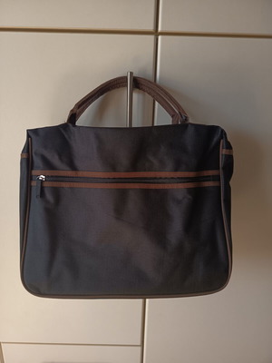 Laptop bag new, black with brown handles and zipper compartments