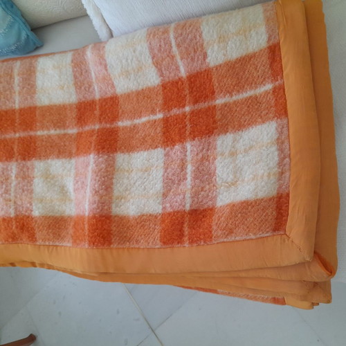 Wool blanket used, orange checkered bicolor