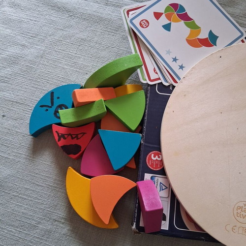 Wooden puzzle for ages 3+ used with cards and box