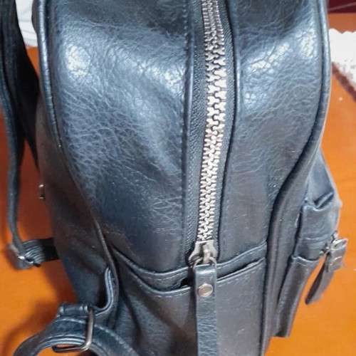 Backpack black medium made of eco leather with silver zippers like new