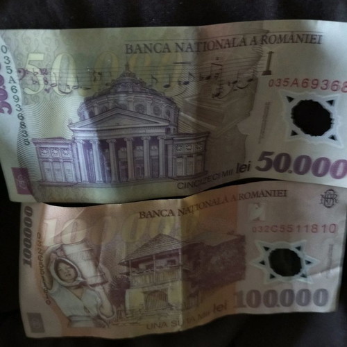 Romanian banknotes used, 10 and 50,000 lei